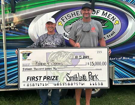David Kilgore and Mike Spears with $15,000 check